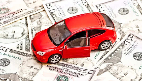 Автомобилей и деньги — стоковое фото
