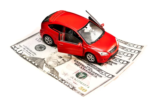 Игрушка автомобиль и деньги над белой. Концепция аренду, Купить или страхование автомобиля — стоковое фото