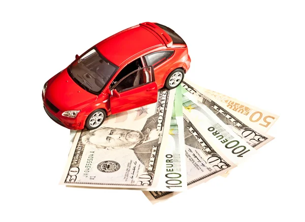 Игрушка автомобиль и деньги над белой. Концепция аренду, Купить или страхование автомобиля — стоковое фото